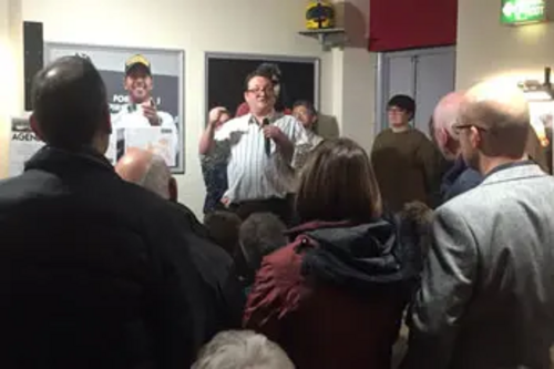 Andy Kelly addresses the standing room only meeting