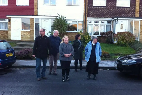 Jude Deakin and other Lib Dem Councillors check out the site for a crossing in Linnet Drive
