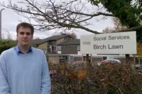 David Goodall outside Birch Lawn Care Home
