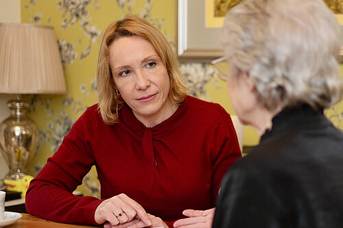 Helen with a local pensioner