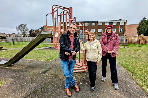The Canford Heath councillor trio stood in a play park