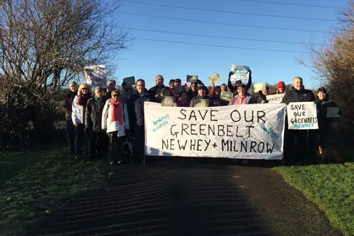 Protesters from Newhey start their march at the Hopwood Arms Pub