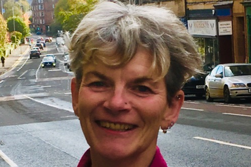 Councillor Pauline Flannery with a road behind her