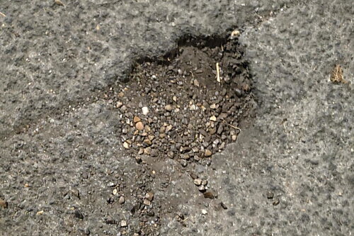 Pothole in Lyminge Way