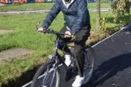 Cllr Mackrory on a bicycle