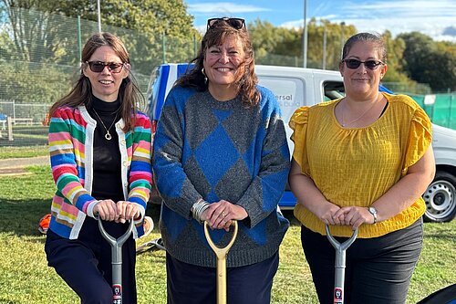 Cllrs Debbie Mickelburgh, Sarah Conboy, and Jo Harvey using shovels in a groundbreaking ceremony
