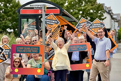 Tom Gordon and bus campaigners celebrate
