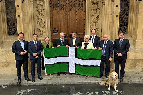 image of Devon MPs with Devon Flag