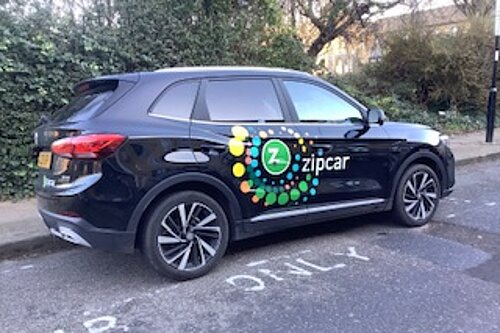 A Zip Car parked on an Islington street