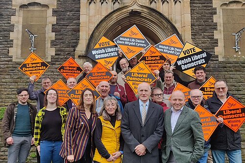 A group of Lib Dems including Sam Bennett and Jane Dodds MS welcoming the new councillors in the Uplands