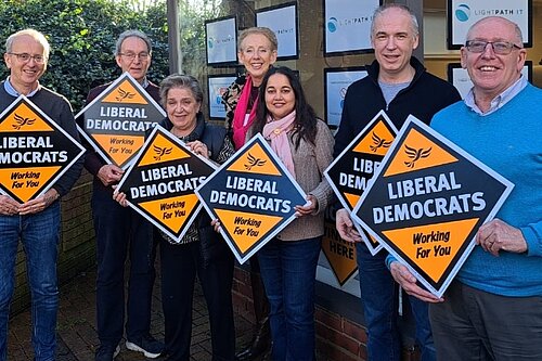 Lib Dem team outside local party HQ
