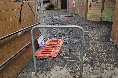 A muddy subway crossing at Hanger Lane Gyratory.