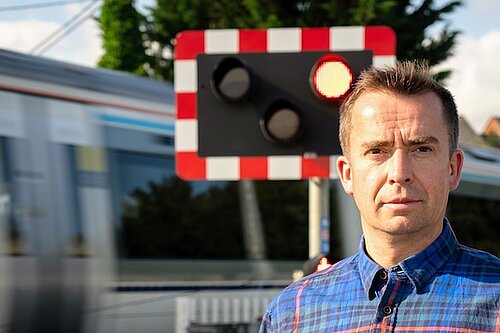 Calum Miller MP at the London Road Level Crossing