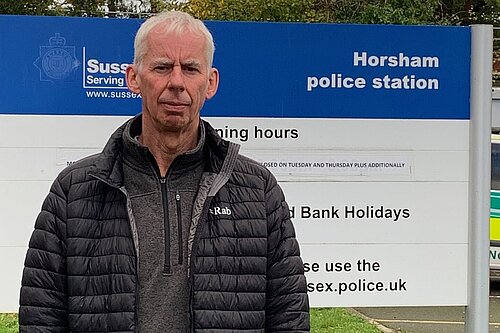 John Milne outside Horsham Police Station