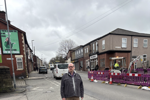 Iain Donaldson at the Heywood Station Bridge which was dug up by the Utilities again.