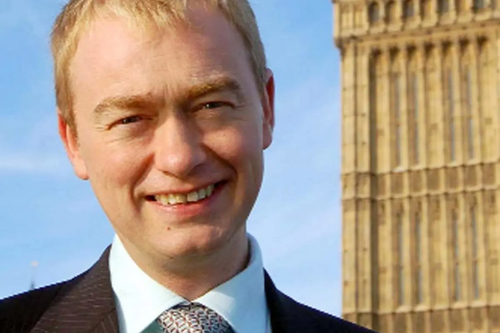 Tim Farron portrait in front of Westminster
