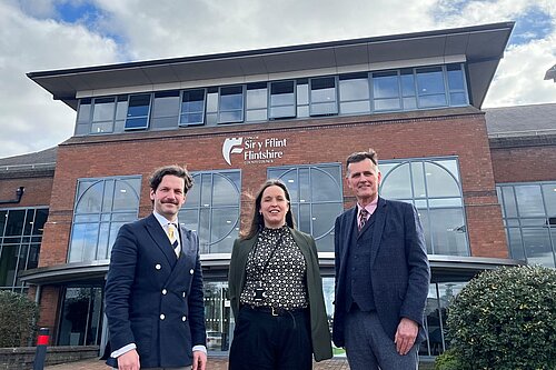 Councillors David Coggins Cogan, Fran Lister & Andrew Parkhurst standing outside Flintshire County Council HQ
