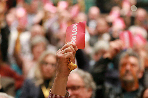 Delegates voting at Lib Dem Conference