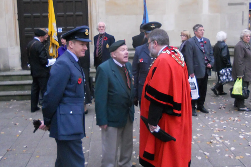Mayor Dave Hodgson with forces veterans following the Remembrance Service at Boots Corner in Bedford