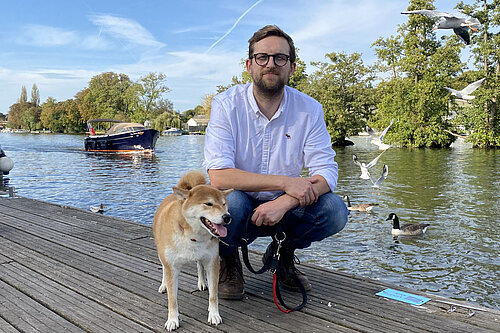 Freddie next to the Thames with his dog
