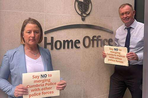 Libby and Tim outside the Home Office