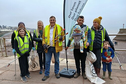 image of people at a beach clean